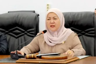 1106 Henny Rosgiaty Rusli